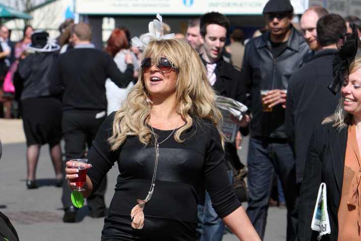Racegoers at the 'Liverpool Day' at Aintree races as the Grand National meeting kicked off, UK