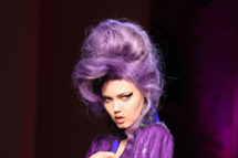 A model presents a creation by French designer Jean Paul Gaultier during the Spring/Summer 2012 Haute Couture collection show, on January 25, 2012 in Paris.