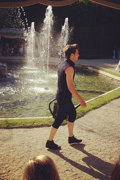 Male model with watering can bag.
