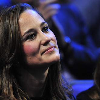 Pippa Middleton, sister of Catherine, Duchess of Cambridge, watches Jo-Wilfried Tsonga of France play against Roger Federer of Switzerland during the singles final on day eight of the ATP World Tour Finals tennis tournament in London on November 27, 2011. Roger Federer won a record sixth ATP World Tour Finals title with a 6-3, 6-7 (6/8), 6-3 victory over France's Jo-Wilfried Tsonga on Sunday. With this win he moved ahead of Pete Sampras and Ivan Lendl on the list of Tour Finals champions in the 100th final of his majestic career. The 30-year-old, who retains the title he won 12 months ago, has now won 70 trophies in his career and has also equalled Lendl's record of 39 match wins in the end-of-season event. AFP PHOTO / GLYN KIRK (Photo credit should read GLYN KIRK/AFP/Getty Images)