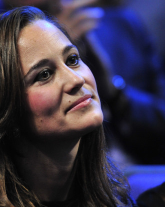 Pippa Middleton, sister of Catherine, Duchess of Cambridge, watches Jo-Wilfried Tsonga of France play against Roger Federer of Switzerland during the singles final on day eight of the ATP World Tour Finals tennis tournament in London on November 27, 2011. Roger Federer won a record sixth ATP World Tour Finals title with a 6-3, 6-7 (6/8), 6-3 victory over France's Jo-Wilfried Tsonga on Sunday. With this win he moved ahead of Pete Sampras and Ivan Lendl on the list of Tour Finals champions in the 100th final of his majestic career. The 30-year-old, who retains the title he won 12 months ago, has now won 70 trophies in his career and has also equalled Lendl's record of 39 match wins in the end-of-season event. AFP PHOTO / GLYN KIRK (Photo credit should read GLYN KIRK/AFP/Getty Images)