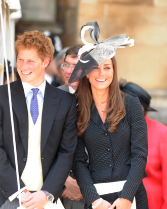 WINDSOR, ENGLAND - JUNE 16: (NO PUBLICATION IN UK MEDIA FOR 28 DAYS) Prince Harry and Prince William's girlfriend Kate Middleton laugh together as they watch the Order of the Garter procession at Windsor Castle on June 16, 2008 in Windsor, England. (Photo by POOL/ Tim Graham Picture Library/Getty Images) *** Local Caption *** Prince Harry;Kate Middleton