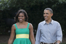 U.S. President Barack Obama and first lady Michelle Obama walk to the South Lawn of the White House on June 27, 2012 in Washington, D.D. The annual picnic was held for members of Congress.