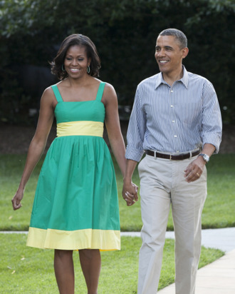 U.S. President Barack Obama and first lady Michelle Obama walk to the South Lawn of the White House on June 27, 2012 in Washington, D.D. The annual picnic was held for members of Congress.