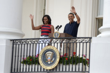 U.S. President Barack Obama, with first lady Michelle Obama delivers remarks to an Independence Day picinic on the South Lawn of the White House on July 4, 2012 in Washington, D.C.