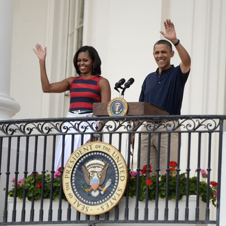 U.S. President Barack Obama, with first lady Michelle Obama delivers remarks to an Independence Day picinic on the South Lawn of the White House on July 4, 2012 in Washington, D.C.