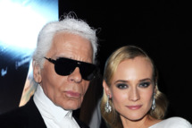Designer Karl Lagerfeld and actress Diane Kruger attend the 2012 amfAR's Cinema Against AIDS during the 65th Annual Cannes Film Festival at Hotel Du Cap on May 24, 2012 in Cap D'Antibes, France.