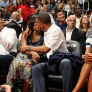 President of the United States of America Barack Obama and First Lady Michelle Obama are put on the Kiss Cam at the 2012 US Men's Senior National Team vs the Brazilian Men's Senior National Team game at the Verizon Center on July 16, 2012 in Washington, DC.