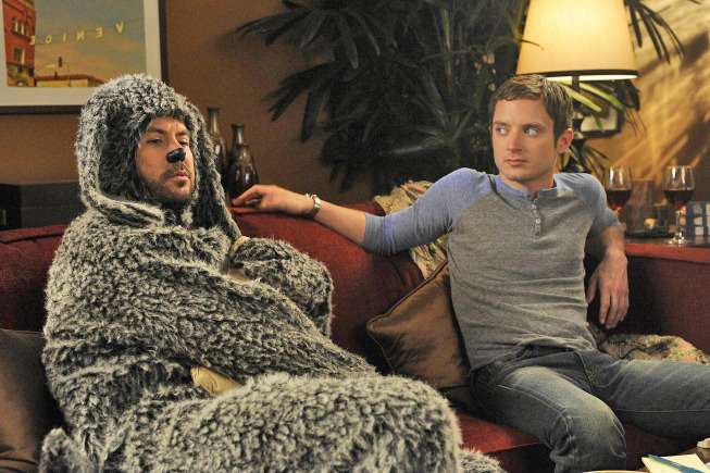 WILFRED: L-R: Jason Gann and Elijah Wood in the WILFRED episode "Conscience" (Airs July 28, 10:00 pm e/p) on FX. CR: Ray Mickshaw / FX.
