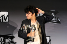 LOS ANGELES, CA - AUGUST 28: Singer Lady Gaga dressed as "Jo Calderone", winner of Best Female Video Award and Best Video with a Message Award for "Born This Way" poses in the press room during the 2011 MTV Video Music Awards at Nokia Theatre L.A. LIVE on August 28, 2011 in Los Angeles, California. (Photo by Jason Merritt/Getty Images)
