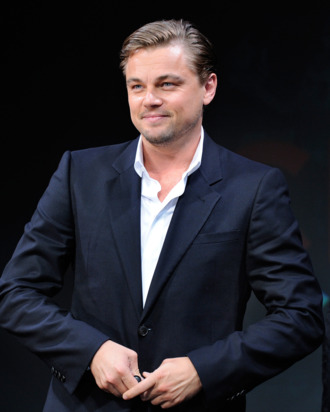 US movie actor Leonardo DiCaprio smiles as he adjust his jacket during a press conference to promote his latest film 'Inception' in Tokyo on July 21, 2010. The new movie will be shown all over Japan from July 23. AFP PHOTO/Toru YAMANAKA (Photo credit should read TORU YAMANAKA/AFP/Getty Images)