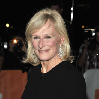 TORONTO, ON - SEPTEMBER 11: Actress/co-writer Glenn Close poses on the red carpet at the premiere of