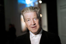 US film director David Lynch poses at the French cinematheque (La Cinematheque Francaise) on October 13, 2010, in Paris during a visit of the "Brune/Blonde" (Brunette/Blond) exhibition. The event runs until January 16, 2011. AFP PHOTO POOL FRED DUFOUR (Photo credit should read FRED DUFOUR/AFP/Getty Images)