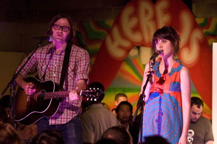 DENVER - AUGUST 27: Ben Gibbard and Zooey Deschanel perform on the VIP stage at Unconventional '08 at the Manifest Hope Gallery on August 27, 2008 in Denver, Colorado. (Photo by Timothy Norris/Getty Images)