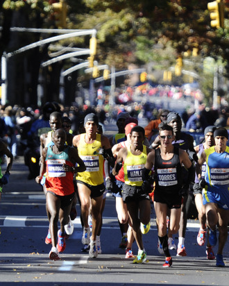 Elite men runners compete in the New York City Marathon in New York on November 7, 2010. Ethiopian Gebre Gebremariam won in a time of 2:08.14 ahead of Kenyans Emmanuel Mutai and Moses Kigen Kipkosgei. World record holder Haile Gebrselassie (C) announced his retirement after dropping out of the race. AFP PHOTO/Emmanuel Dunand (Photo credit should read EMMANUEL DUNAND/AFP/Getty Images)