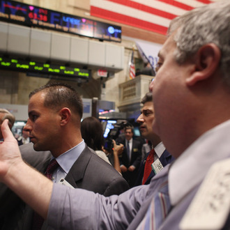 NEW YORK, NY - NOVEMBER 01: Traders work on the floor of the New York Stock Exchange before the closing bell on November 1, 2011 in New York City. U.S. stocks and global markets fell sharply Tuesday following news that Greece's prime minister has called for an unexpected public vote to approve Europe's debt deal. The Dow Jones industrial average (INDU) finished 297 points lower. Leaders of France and Germany, the architects of the Greek rescue plan, have scheduled an emergency meeting after Greek Prime Minister George Papandreou called for the referendum. (Photo by Spencer Platt/Getty Images)
