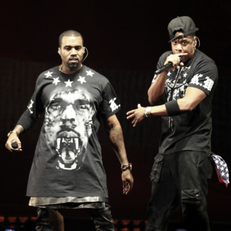 Kanye West, left, and Jay Z perform in concert during the