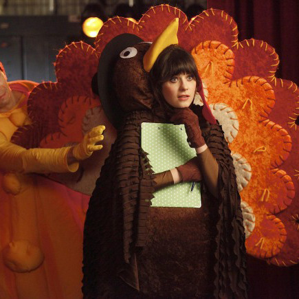 NEW GIRL: Jess (Zooey Deschanel, R) and her crush, fellow teacher Paul (guest star Justin Long, L) watch their students perform in the school Thanksgiving festival in the "Thanksgiving" episode of NEW GIRL airing Tuesday, Nov. 15 (9:01-9:31 PM ET/PT) on FOX. ©2011 Fox Broadcasting Co. Cr: Greg Gayne/FOX©2011 Fox Broadcasting Co. Cr: Greg Gayne/FOX
