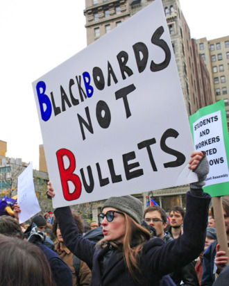 Anne Hathaway carries signs reading 'Blackboards not Bullets' and 'Blackboards not Banks' as she protests at Union Square on for the Occupy Wall Street campaign with her boyfriend Adam Shulman. She then proceeded to march down the street along with the other protestors.
<P>
Pictured: Anne Hathaway
<P>
<B>Ref: SPL335630 171111 </B><BR/>
Picture by: Splash News<BR/>
</P><P>
<B>Splash News and Pictures</B><BR/>
Los Angeles: 310-821-2666<BR/>
New York: 212-619-2666<BR/>
London: 870-934-2666<BR/>
photodesk@splashnews.com<BR/>
</P>