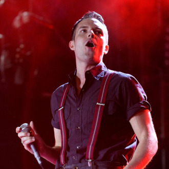Singer Brandon Flowers peforms during Los 40 Principales concert at Estadio Azteca on April 12, 2011 in Mexico City, Mexico.