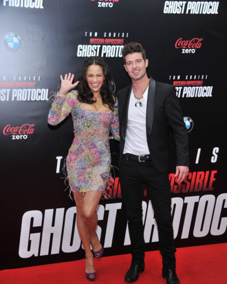 NEW YORK, NY - DECEMBER 19: Paula Patton and Robin Thicke attend the