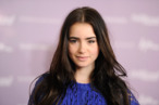 BEVERLY HILLS, CA - DECEMBER 07: Actress Lily Collins arrives at The Hollywood Reporter's Annual