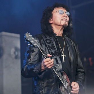 LONDON, UNITED KINGDOM - JULY 24: Tony Iommi performs for the last time ever with Heaven And Hell as a tribute to the late Ronnie James Dio at Day 1 of the High Voltage Festival at Victoria Park on July 24, 2010 in London, England. (Photo by Christie Goodwin/Getty Images) *** Local Caption *** Tony Iommi
