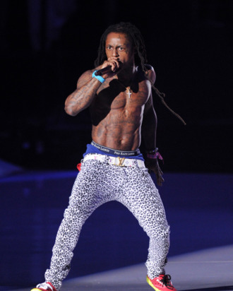 LOS ANGELES, CA - AUGUST 28: Rapper Lil Wayne performs onstage during the 2011 MTV Video Music Awards at Nokia Theatre L.A. LIVE on August 28, 2011 in Los Angeles, California. (Photo by Kevin Winter/Getty Images)