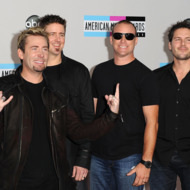 LOS ANGELES, CA - NOVEMBER 20: (L-R) Musicians Chad Kroeger, Daniel Adair, Mike Kroeger and Ryan Peake of Nickelback arrive at the 2011 American Music Awards held at Nokia Theatre L.A. LIVE on November 20, 2011 in Los Angeles, California. (Photo by Jason Merritt/Getty Images)
