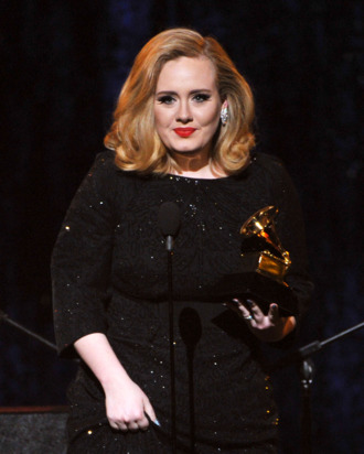 LOS ANGELES, CA - FEBRUARY 12: Singer Adele accepts the Best Pop Solo Performance Aweard for