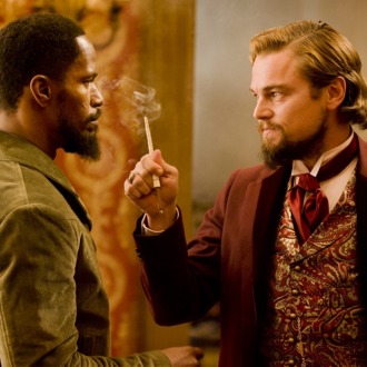 Jamie Foxx, left, and Leonardo DiCaprio in Columbia Pictures'