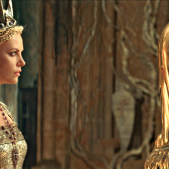 The Queen (CHARLIZE THERON) consults with the Mirror Man in the epic action-adventure