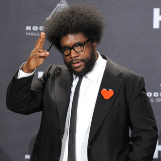 Questlove poses in the press room during the 27th Annual Rock And Roll Hall of Fame Induction Ceremony at Public Hall on April 14, 2012 in Cleveland, Ohio.