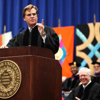 Aaron Sorkin, screenwriter, producer and playwright, points as he looks to the crowd during an address