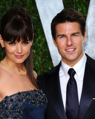 WEST HOLLYWOOD, CA - FEBRUARY 26: Actress Katie Holmes (L) and actor Tom Cruise arrives at the 2012 Vanity Fair Oscar Party hosted by Graydon Carter at Sunset Tower on February 26, 2012 in West Hollywood, California. (Photo by Alberto E. Rodriguez/Getty Images)