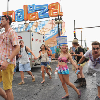 CHICAGO, IL - AUGUST 04: Fans are evacuated from Grant park due to an approaching storm during 2012 Lollapalooza at Grant Park on August 4, 2012 in Chicago, Illinois. (Photo by Theo Wargo/Getty Images)