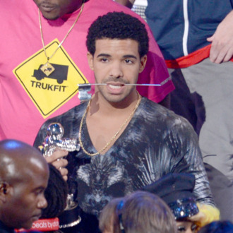 LOS ANGELES, CA - SEPTEMBER 06: Recording artist Drake accepts the award for Best Hip Hop Video onstage during the 2012 MTV Video Music Awards at Staples Center on September 6, 2012 in Los Angeles, California. (Photo by Kevin Winter/Getty Images)