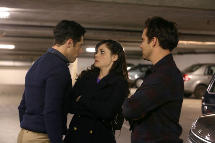NEW GIRL: L-R: Schmidt (Max Greenfield), Jess (Zooey Deschanel) and Nick (Jake Johnson) battle it out for a newly discovered parking spot in their building in the "Parking Spot" episode of NEW GIRL airing Tuesday, Feb. 19 (9:00-9:30 PM ET/PT)