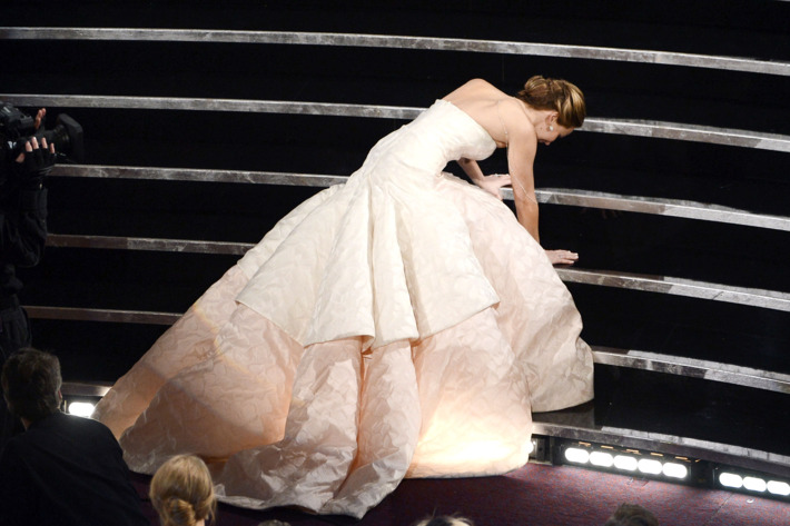 Actress Jennifer Lawrence reacts after winning the Best Actress award for "Silver Linings Playbook" during the Oscars held at the Dolby Theatre on February 24, 2013 in Hollywood, California.