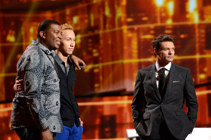 AMERICAN IDOL: Curtis Finch, Jr. (L), Devin Velez (C) and Ryan Seacrest (R) wait to see who will be eliminated on AMERICAN IDOL Thursday, March 14 (8:00-9:00PM ET/PT)