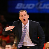 Head coach Mike Rice of the Rutgers Scarlet Knights shouts instructions to his team against Notre Dame Fighting Irish during the second round of the Big East Tournament at Madison Square Garden on March 13, 2013 in New York City.
