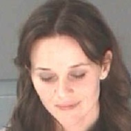 In this booking photo provided by the City of Atlanta Department of Corrections, actress Reese Witherspoon, real name Laura Jeanne Witherspoon, poses in a booking photo on April 19, 2013 in Atlanta, Georgia. Witherspoon was charged with disorderly conduct after her husband, Jim Toth, was arrested for driving while intoxicated.