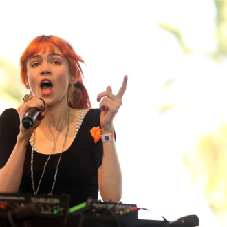 Musician Grimes performs onstage during day 3 of the 2013 Coachella Valley Music & Arts Festival at the Empire Polo Club on April 14, 2013 in Indio, California.