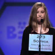 Sophia Limacher of Seattle, Washington, reacts after she misspelled her word in the round five of the 2013 Scripps National Spelling Bee May 30, 2013 at Gaylord National Resort and Convention Center in National Harbor, Maryland. Forty-two have advanced to the semifinal of the annual spelling contest for the championship.