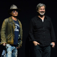 LAS VEGAS, NV - APRIL 17: Actor Johnny Depp (L) and director Gore Verbinski appear at a Walt Disney Studios Motion Pictures presentation to promote their upcoming film "The Lone Ranger" at The Colosseum at Caesars Palace during CinemaCon, the official convention of the National Association of Theatre Owners, on April 17, 2013 in Las Vegas, Nevada. (Photo by Ethan Miller/Getty Images)