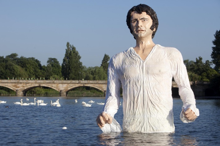 UKTV launch new free channel. EDITORIAL USE ONLY A statue of Jane Austen's romantic hero Mr Darcy in The Serpentine in London's Hyde Park to celebrate the launch of UKTV's new free channel 'Drama'. Picture date: Monday July 8, 2013. The 12 foot statue, which took a team of three sculptors over two months to design, construct and paint, pays homage to the show-stealing lake scene that was voted one of the most memorable British TV drama moments of all time and marks the 200th anniversary of the publication of Pride and Prejudice in 1813. New channel Drama is available on Freeview channel 20 and Sky. Photo credit should read: David Parry/PA Wire URN:17006101