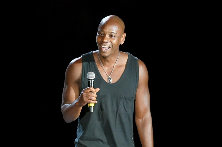 Dave Chappelle performs on stage during the first night of the Oddball Comedy & Curiosity Festival Tour at Austin360 Amphitheater on August 23, 2013 in Austin, Texas.
