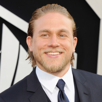 HOLLYWOOD, CA - JULY 09: Actor Charlie Hunnam arrives at the Los Angeles Premiere
