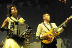 SAN FRANCISCO, CA - AUGUST 14: Musicians Regine Chassagne and Win Butler of Arcade Fire perform at the Lands End Stage during the 2011 Outside Lands Music And Arts Festival at Golden Gate Park on August 14, 2011 in San Francisco, California. (Photo by Jeff Kravitz/FilmMagic)