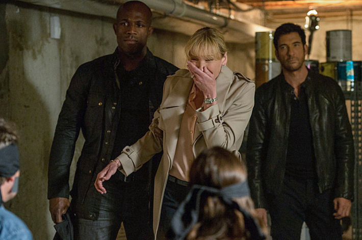 "Invisible Leash"-- Rogue FBI agent Duncan Carlisle (Dylan McDermott) and a group of armed intruders invade the home of Dr. Ellen Sanders (Toni Collette), a prominent Washington D.C. surgeon, and hold her and her family captive, threatening to kill them if she does not assassinate the President of the United States during surgery, on the series premiere of HOSTAGES Monday, Sept. 23 (10:00-11:00 PM, ET/PT) on the CBS Television Network. Also pictured Billy Brown as Archer Photo: David Giesbrecht /Warner Bros. ???2013 Warner Bros. Television All Rights Reserved